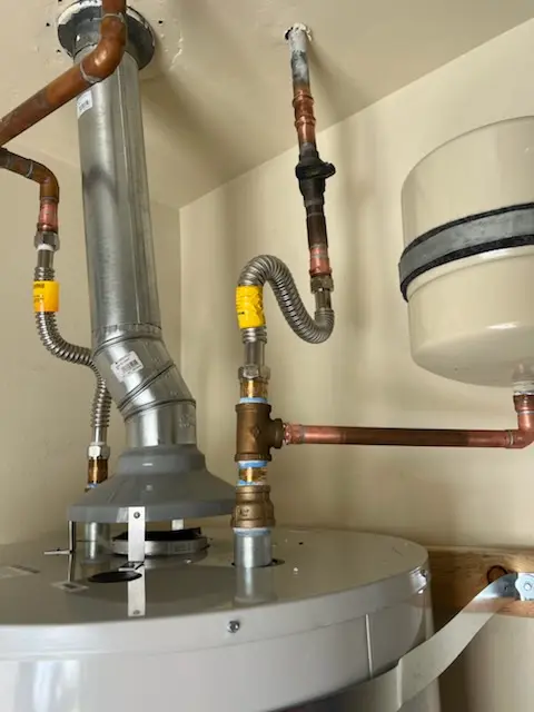 Water heater installation and plumbing repair in Maynard